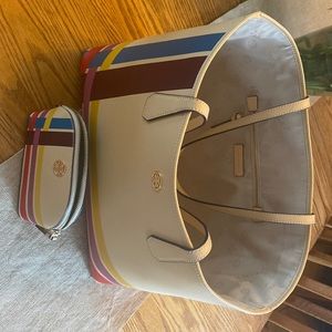 Tory Burch tote with matching cosmetic bag.